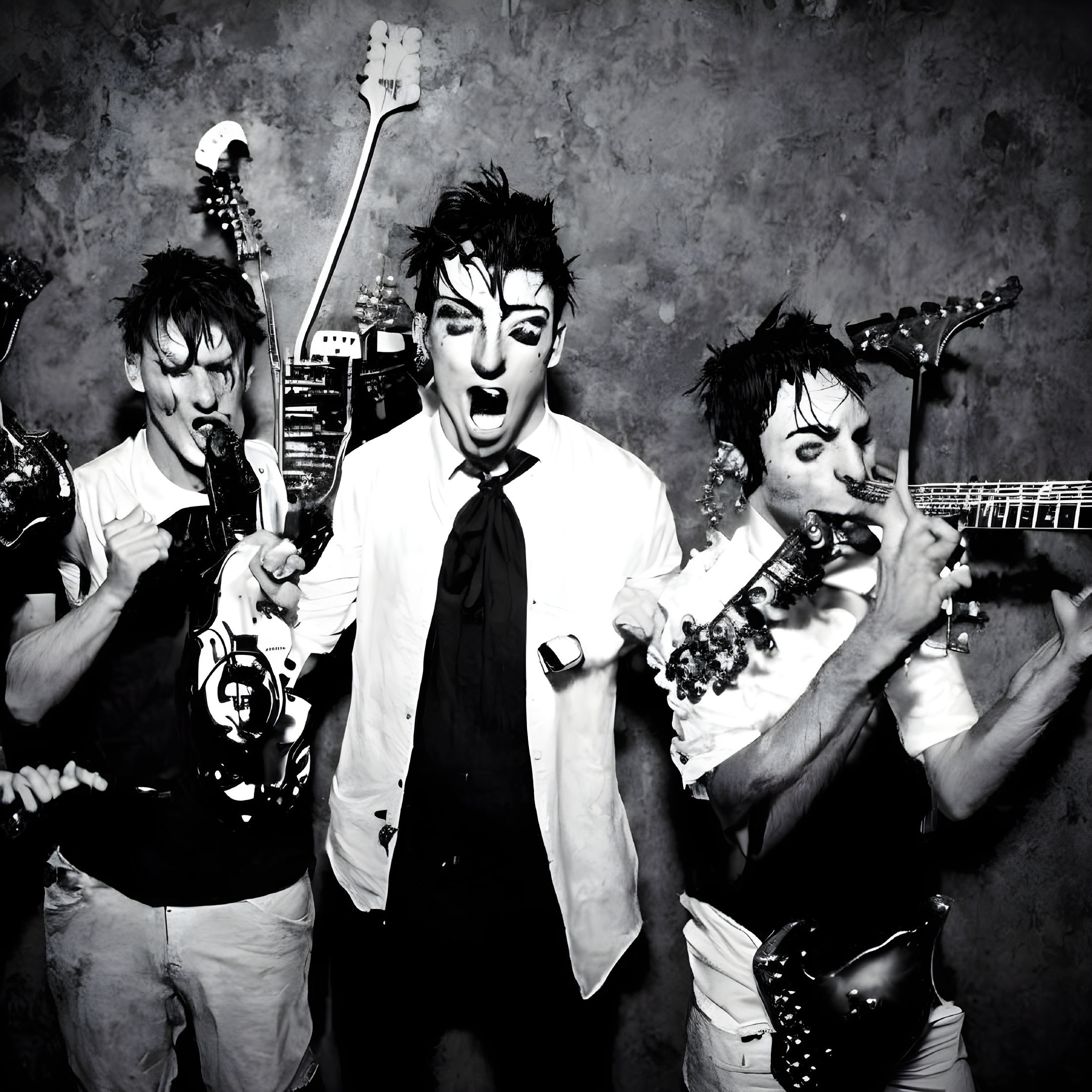 Three musicians in theatrical makeup performing energetically with guitar, singing, and saxophone against textured backdrop