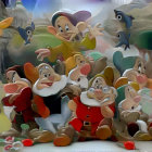 Animated dwarfs in festive winter village with cozy cottages