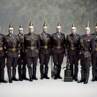 Eight uniformed men in dark military attire with medals and tall pointed helmets standing in a row