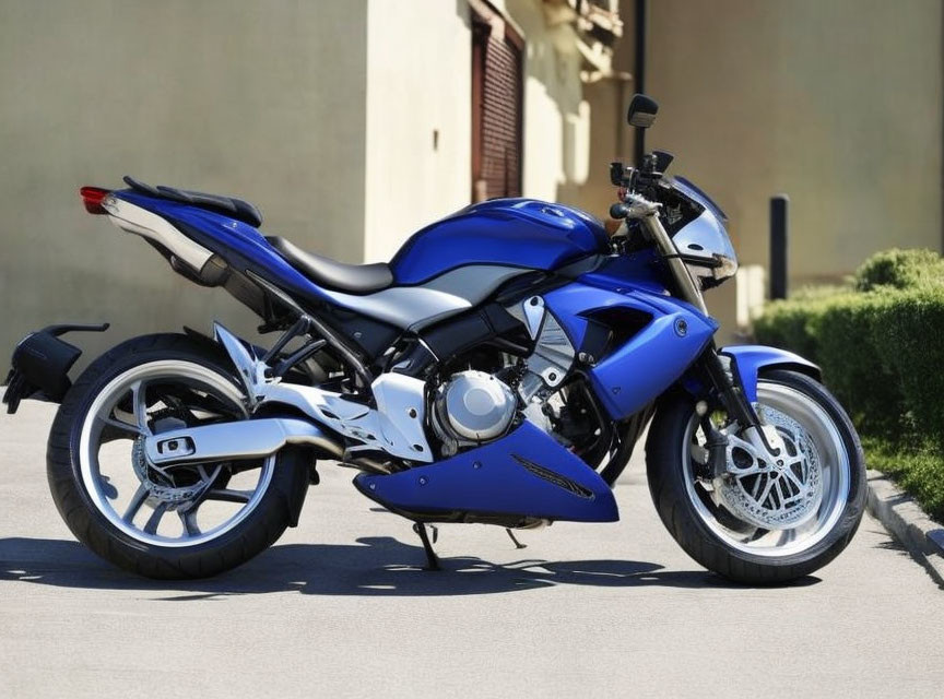 Blue Sports Motorcycle with Alloy Wheels and Sleek Body Design