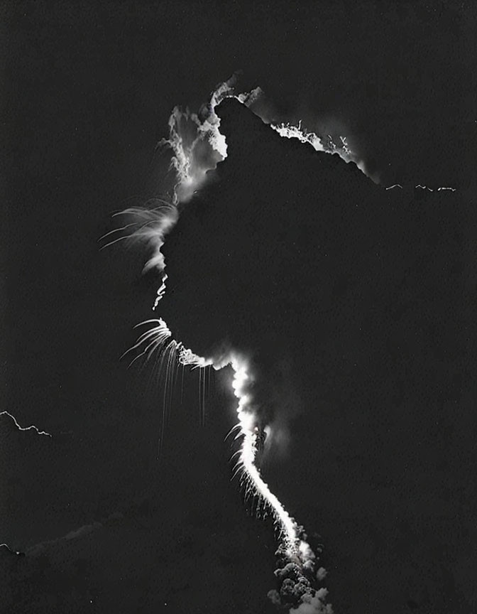 Monochrome photo of explosive volcanic eruption with smoke and debris