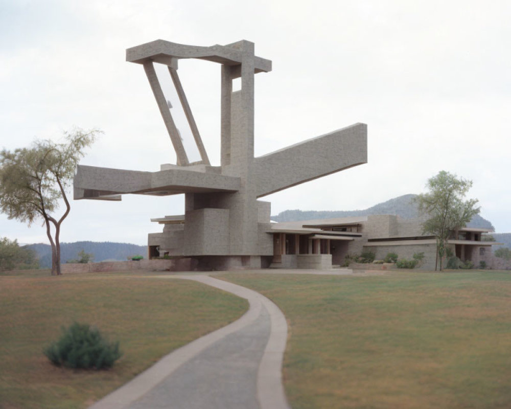 Unique Angular Concrete Building in Serene Landscape