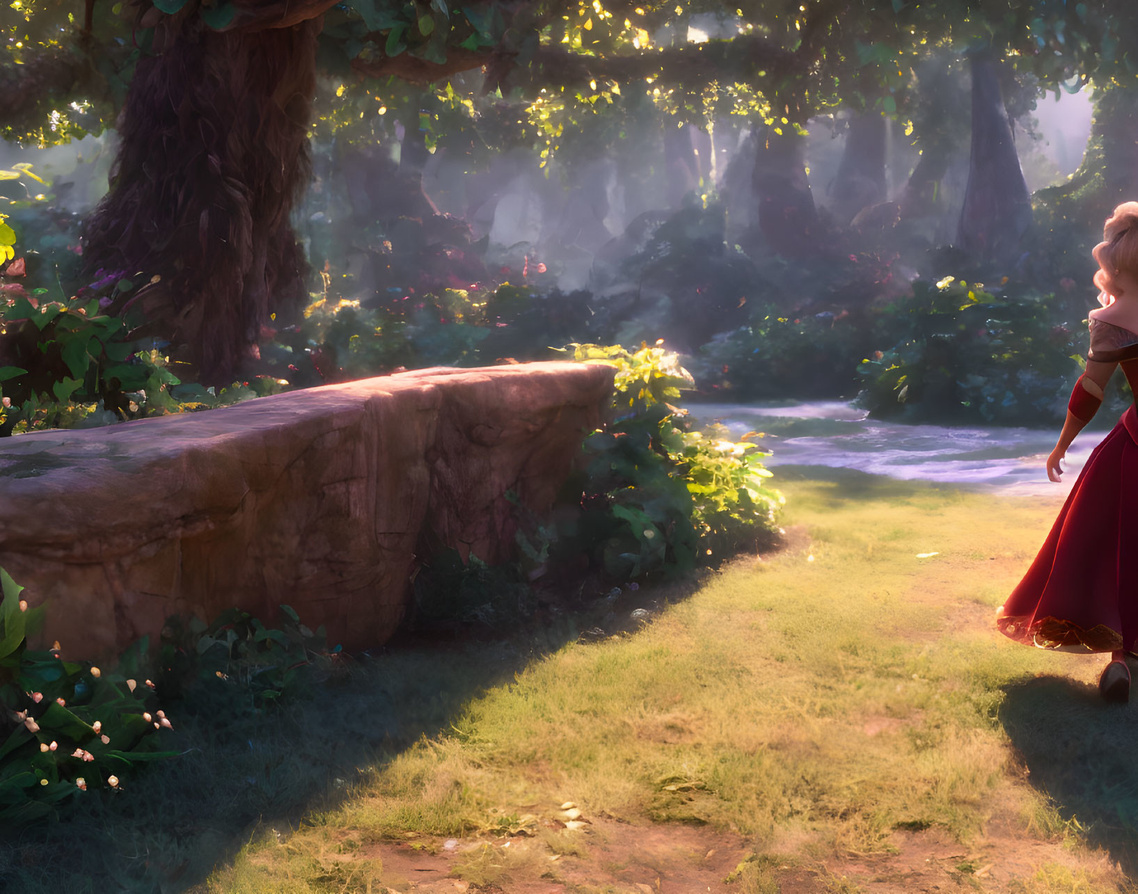 Young girl in red dress gazes at sunlit forest clearing with rock and greenery.