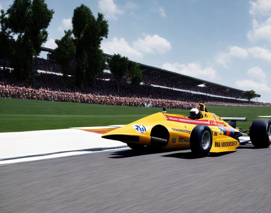 Vintage Formula One car racing on track with crowd under clear skies