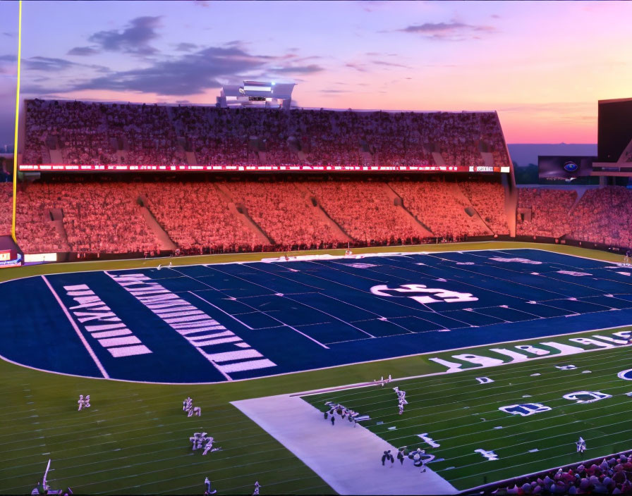 Vibrant sunset over crowded football stadium during game.