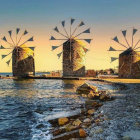 Traditional windmills on rocky islands at sunset by the sea