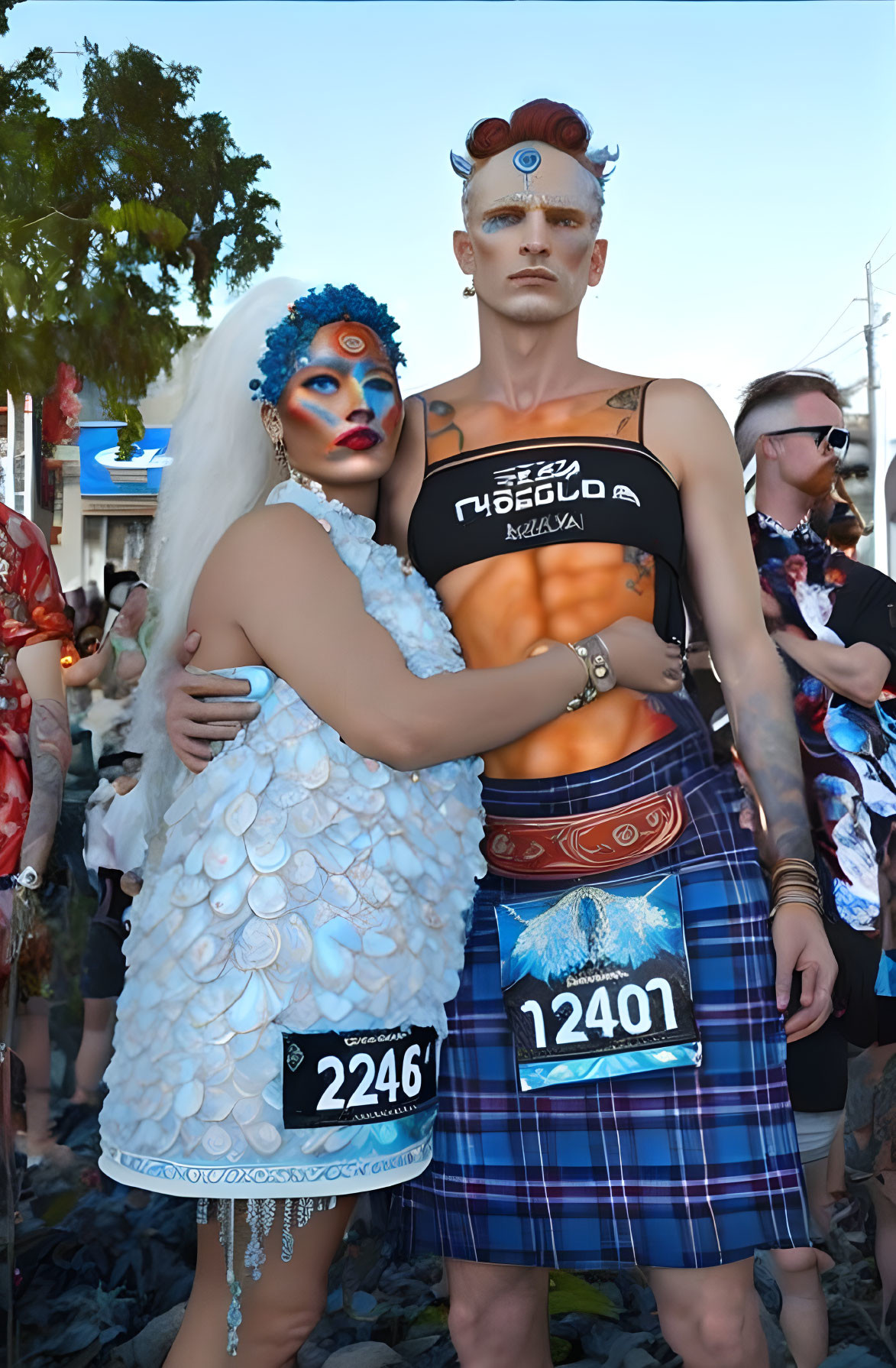 Two individuals in creative costumes and body paint at a festive event