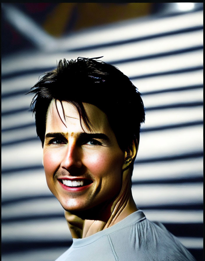 Smiling man with dark hair on abstract background