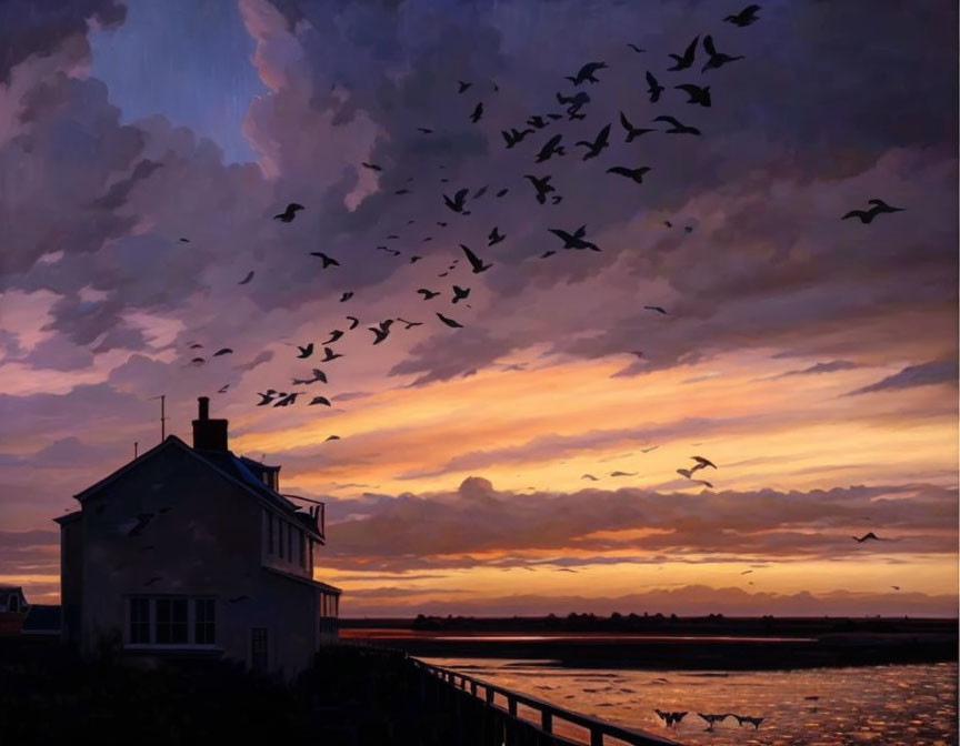 Vibrant sunset hues over house by water with bird silhouettes