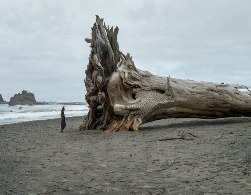 Giant wooden dragon sculpture on beach with intricate carvings