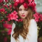 Illustration of Woman with Flowers in Ethereal Forest