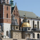 Ornate Historical European Architecture with Towers, Domes, and Multiple Rooflines