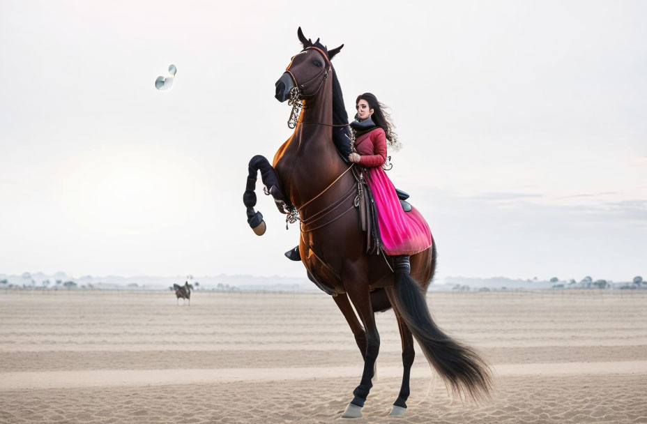 Woman in pink dress riding brown horse on sandy plain with flying hats and another rider.