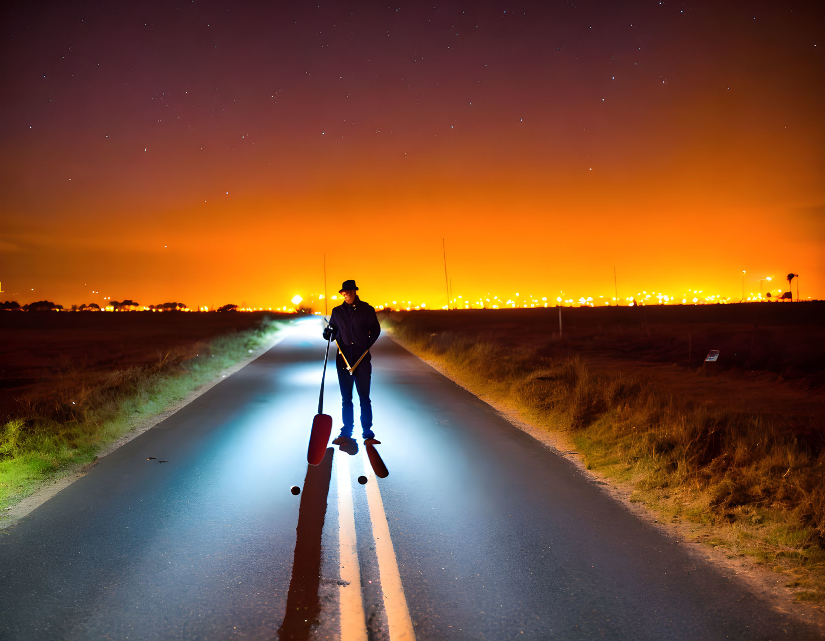 Guitarist in Night Cityscape with Starry Sky