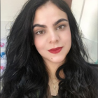 Portrait of Woman with Long Wavy Dark Hair and Brown Eyes