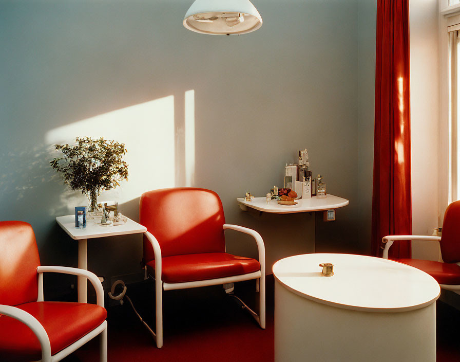 Red Seating, White Tables, Draping Curtains, Bonsai Tree in Cozy Room