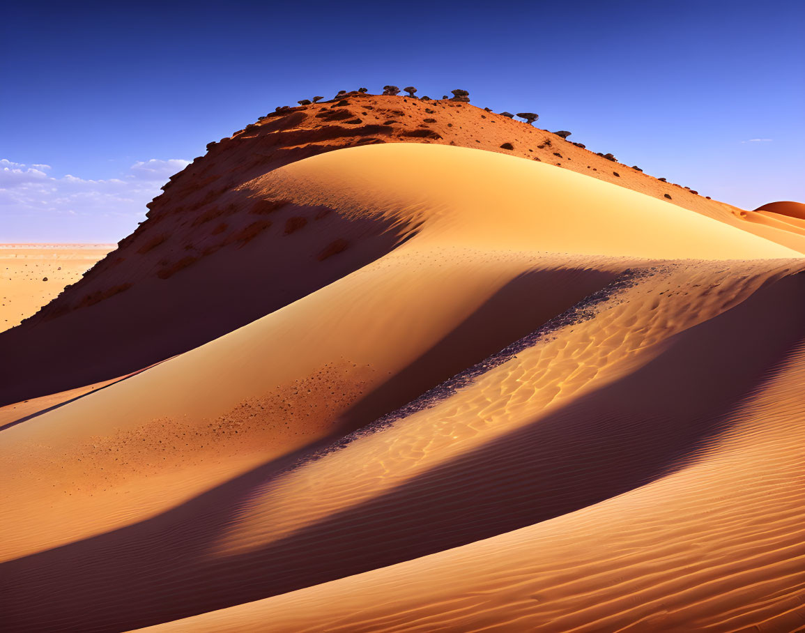 Towering Sand Dune with Sharp Ridges in Serene Desert Landscape