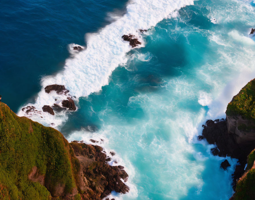 Aerial View of Rugged Coastline with Crashing Waves