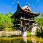 Vietnamese Pagoda on Single Pillar Amidst Green Foliage