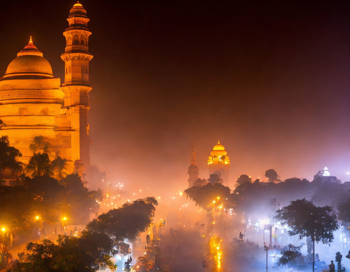 Illuminated domed buildings in misty night scene