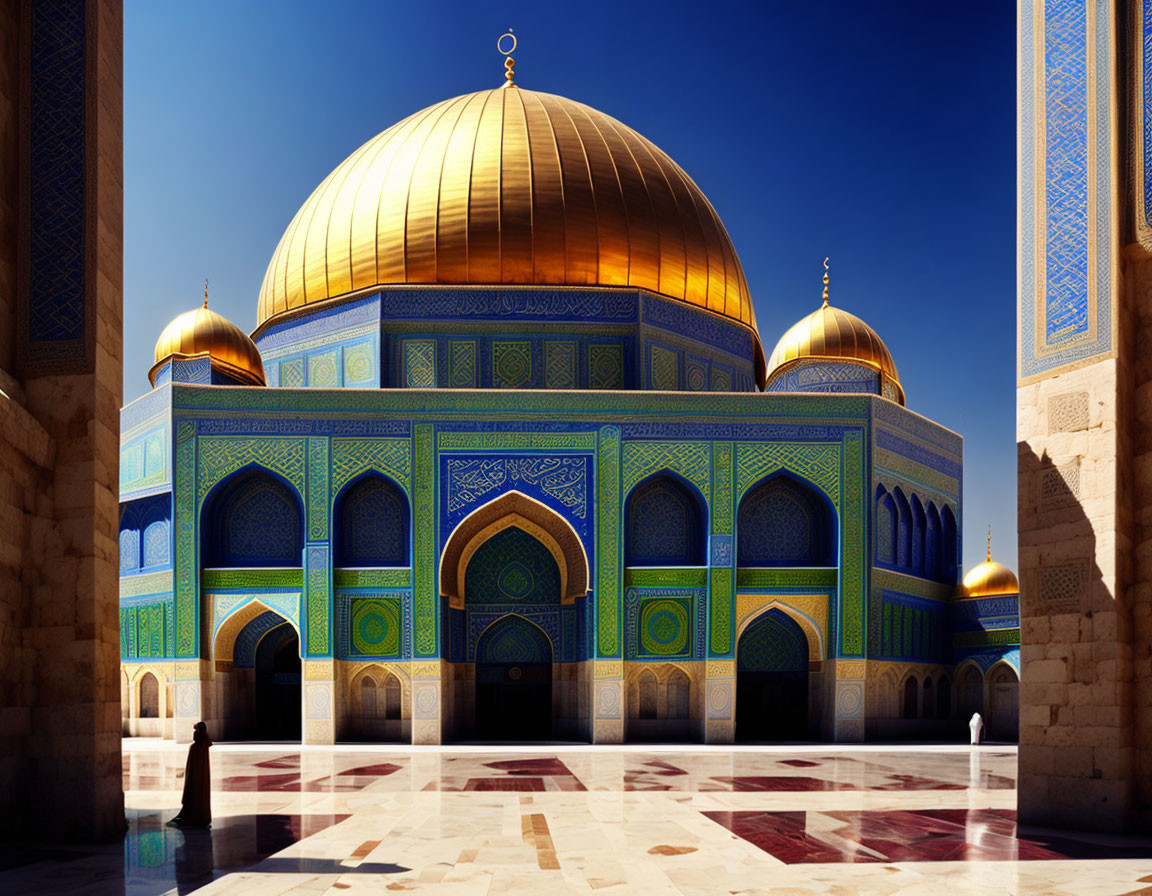 Majestic mosque with golden and blue domes under clear sky