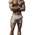 Muscular person in white loincloth and sneakers on black background