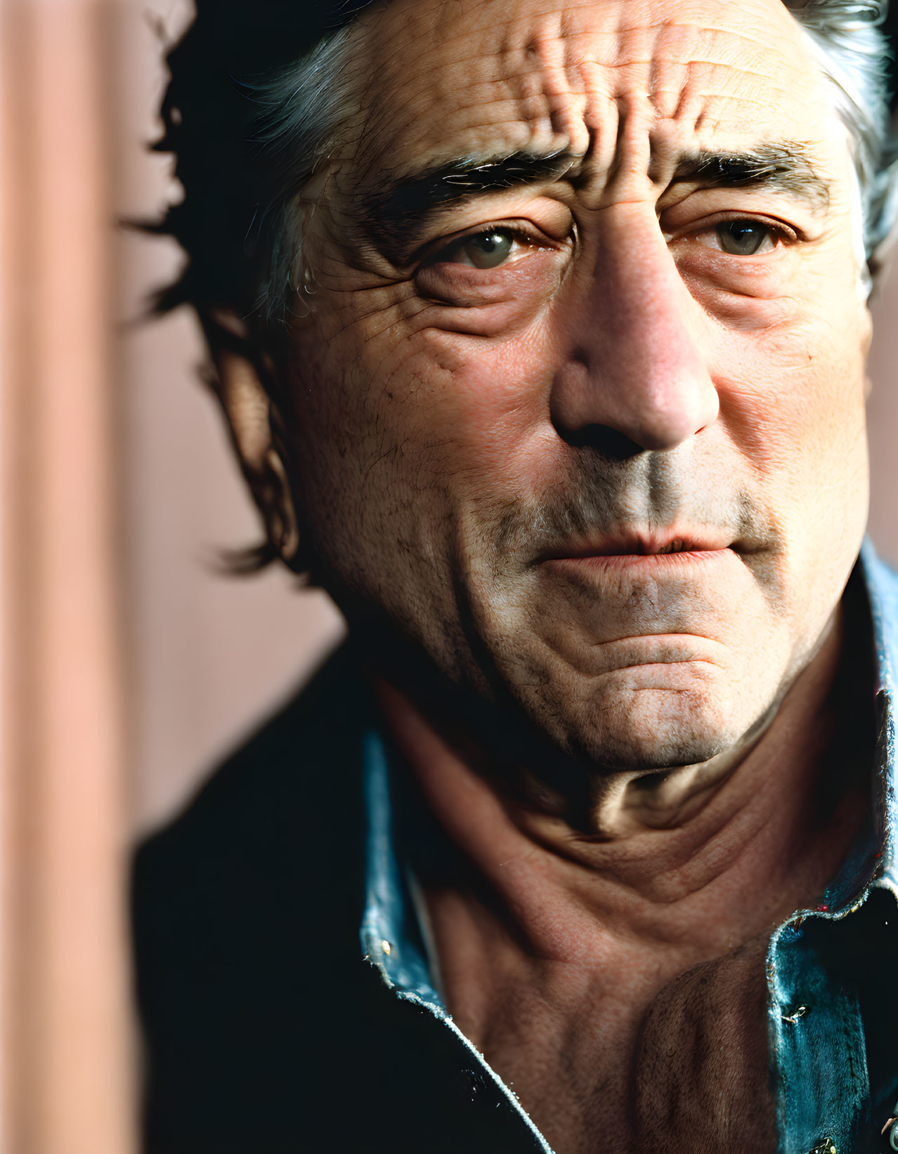 Detailed Close-Up Portrait of Older Man with Wrinkles and Thoughtful Expression