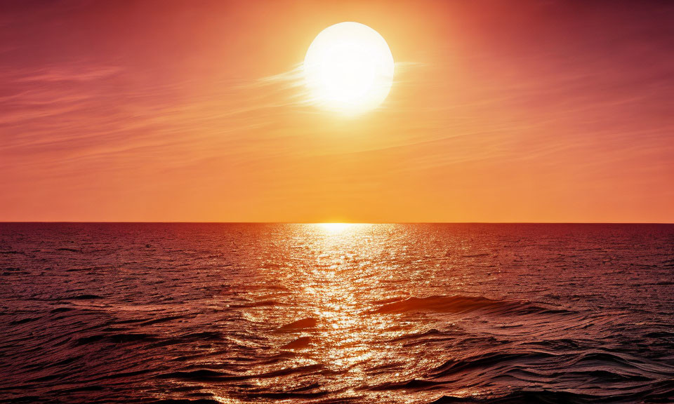 Tranquil sunset scene over calm sea waters