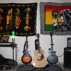 Artistic Music Room with Guitars, Keyboard, Amp, and Artwork