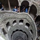 Ornate spiral staircase with intricate metal railings