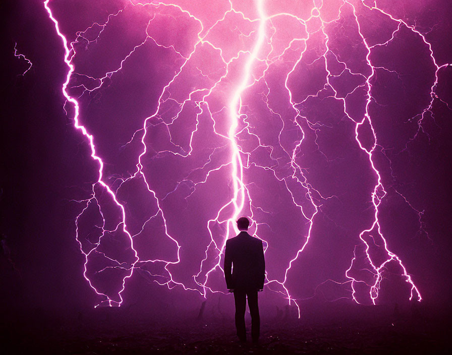 Silhouetted figure in vibrant purple lightning storm