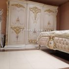 Luxurious Baroque-style Interior with Gold Details & Wall Reliefs