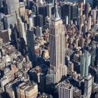 Bustling cityscape with skyscrapers and historic architecture