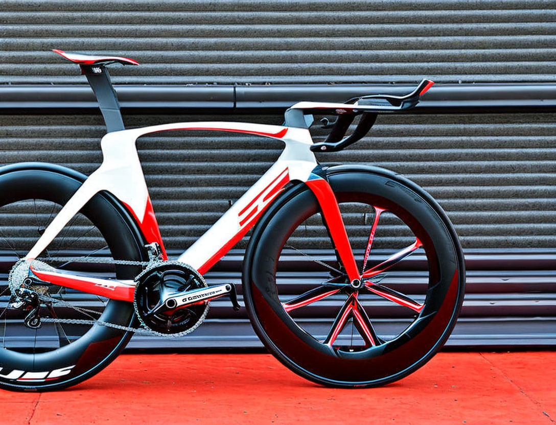 Modern White and Red Time Trial Bicycle with Aerodynamic Frame and Carbon Disc Wheels