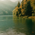 Scenic Autumn Lake with Hazy Mountain View