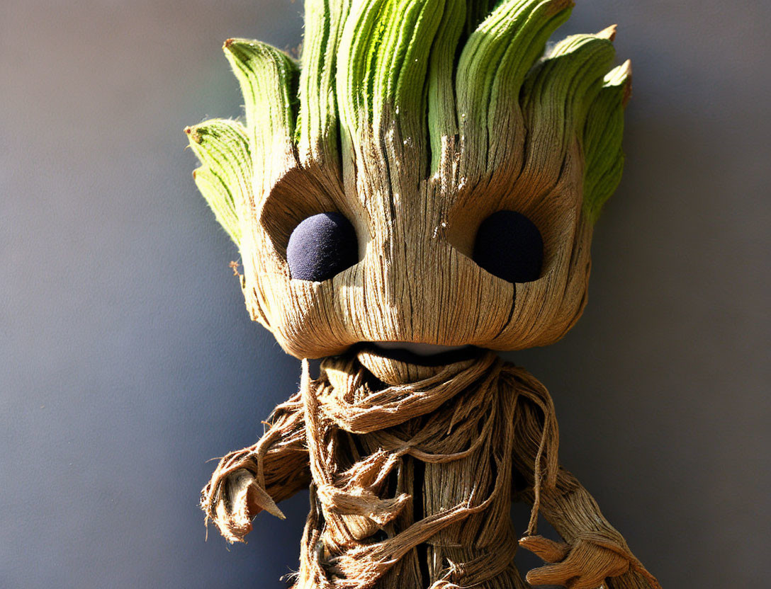 Detailed Groot figurine with wood-like texture and expressive eyes