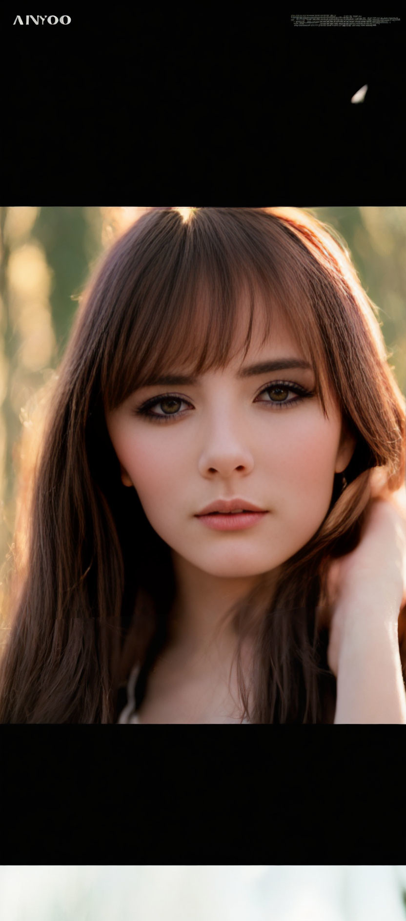 Portrait of Woman with Long Brown Hair and Intense Eyes