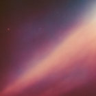 Twilight sky with warm gradient colors and celestial streaks