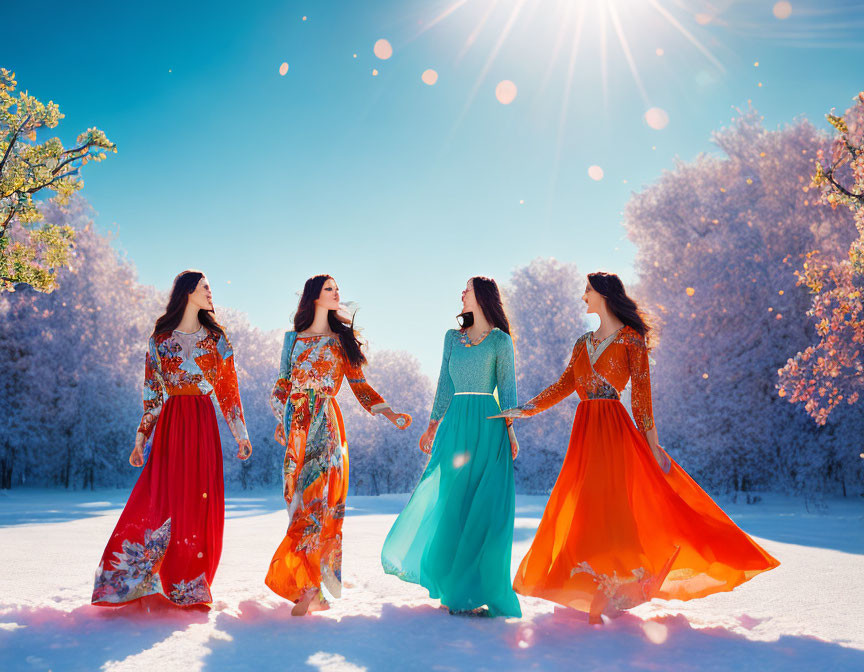 Four Women Walking Hand in Hand in Colorful Dresses in Snowy Landscape