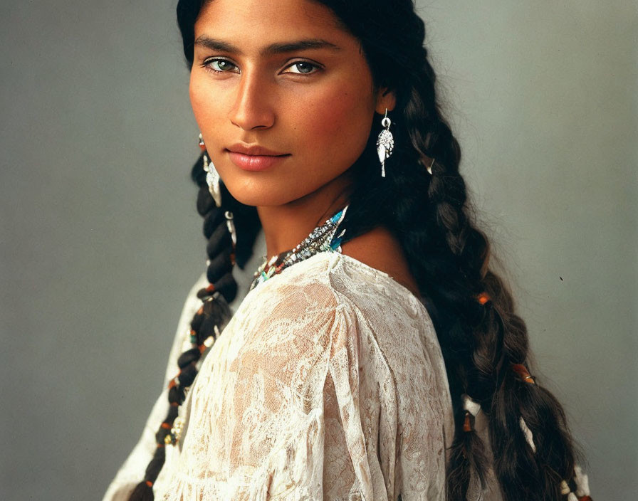 Woman with Blue Eyes, Braided Hair, White Lace Blouse, Turquoise Jewelry