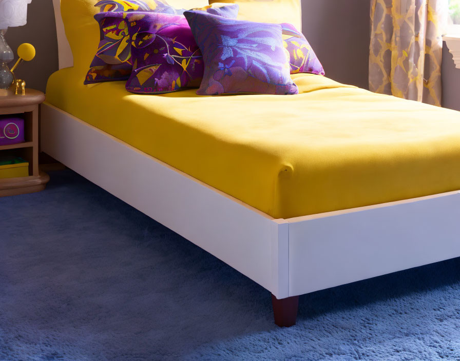 Vibrant yellow and purple bedding on cozy bedroom corner bed.