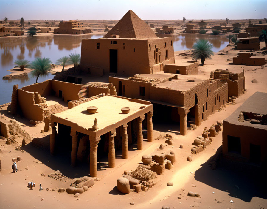 Ancient Nubian mud-brick temple complex in desert oasis