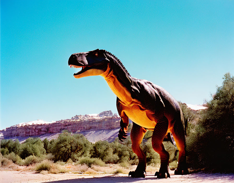 Life-sized dinosaur model on wheels in desert landscape