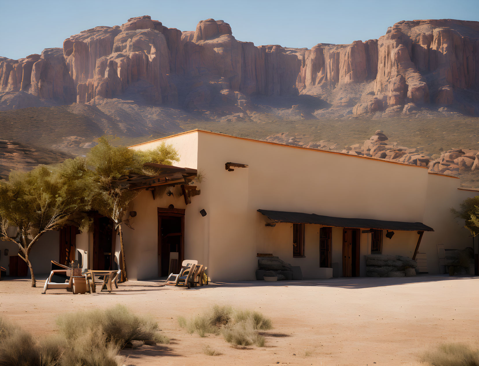 Adobe house with shaded porch in desert oasis.