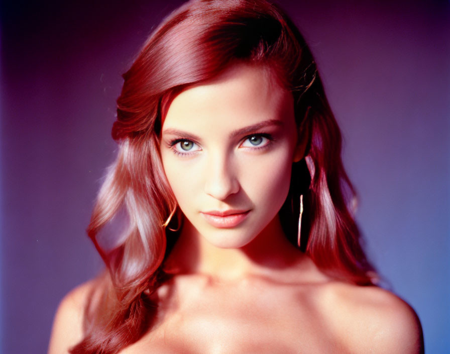 Portrait of Woman with Auburn Hair and Green Eyes on Purple Background