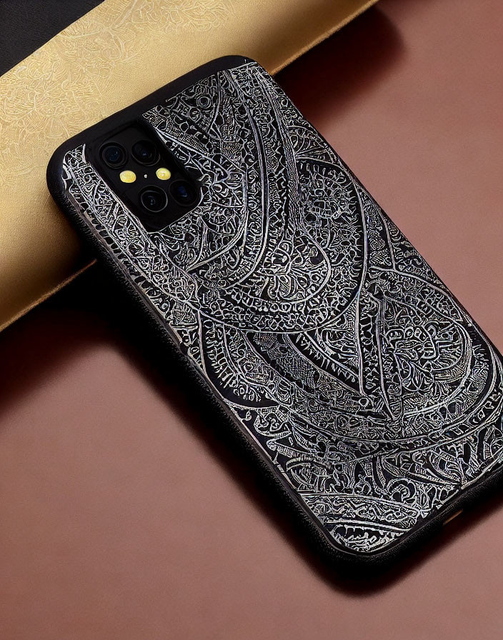 Elaborate Black and White Mandala Smartphone Case on Tan Surface