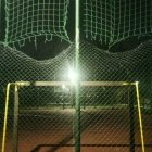 Dimly Lit Soccer Goal Net with Starburst Effect