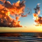 Colorful Ocean Sunset with Sun, Sky, Clouds, and Birds