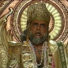 Traditional Indian Attire: Two Men in Turbans and Gold Jewelry