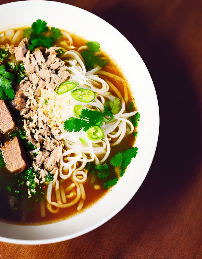 Traditional Vietnamese Pho Bowl with Rice Noodles and Beef Slice